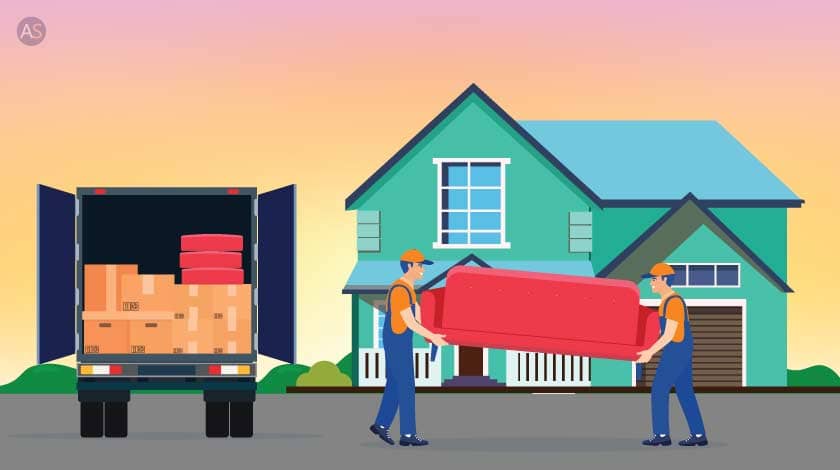 Movers holding up sofa and walking towards truck with carton boxes and sofa cushions