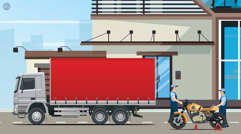 two men standing with bike near truck