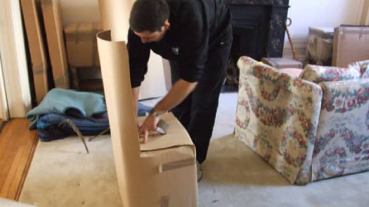Man packing a box