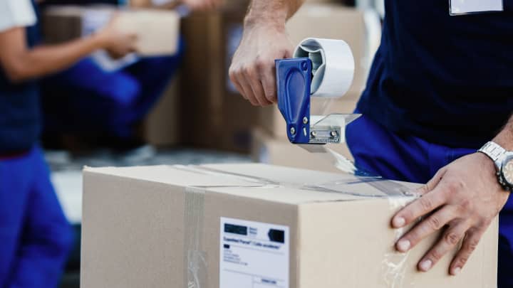 Mover sealing carton box with tape