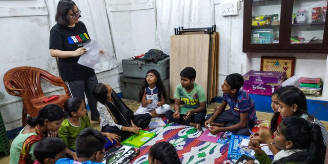 Volunteer Teaching Children at Responsible Charity Kolkata
