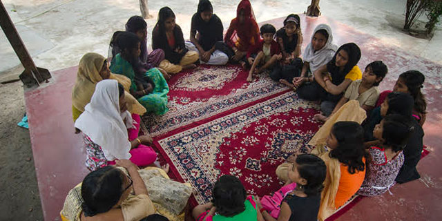 Women and Children Sitting Together at Sanlaap India Kolkata