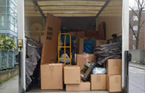 Aman-Safe-Cargo-Packers-Movers-Unloading.jpg