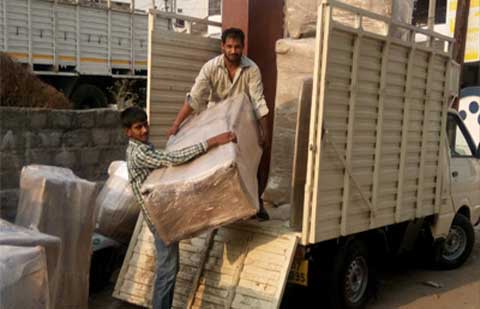Made Easy Cargo Movers Packers Loading.jpg