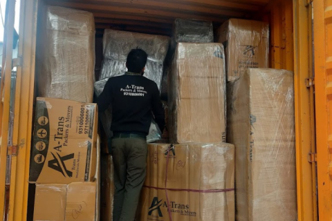 A-Trans-packers-and-movers-loading