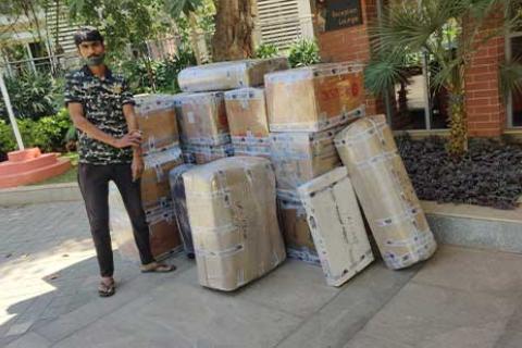 Aadhunik-Road-Carrier-Mumbai-Unpacking.jpg