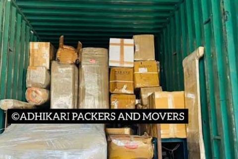 Adhikari Packers Movers Loading