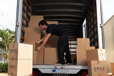 Adhikari Packers Movers Loading