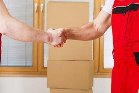 Excellent-Cargo-Movers-and-Packers-Happy-Customer-Handshake