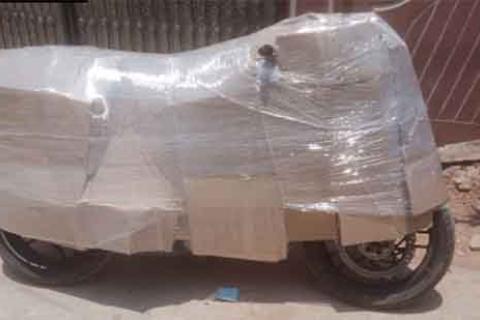 Orange-packers-and-movers-bike-relocation