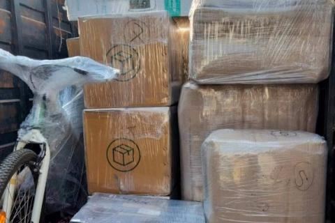 purple-shift-packers-movers-loading