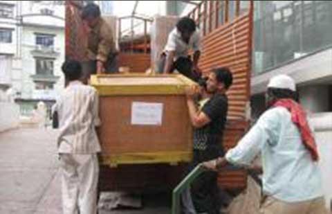Bharat Packers Movers Unloading Goods From Truck