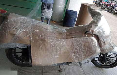 Blue-Fast-Packers-Movers-Bike-Shifting.jpg
