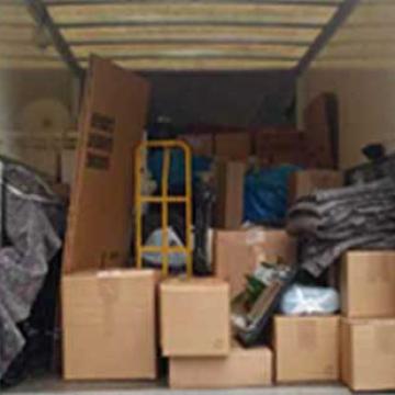 Aman-Safe-Cargo-Packers-Movers-Unloading.jpg